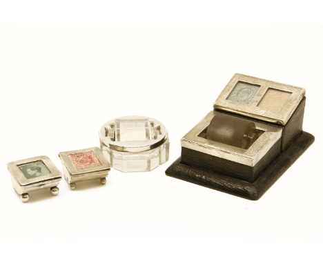 A hallmarked silver stamp box and roller, fitted silver framed top to a leather base together with two further silver topped 