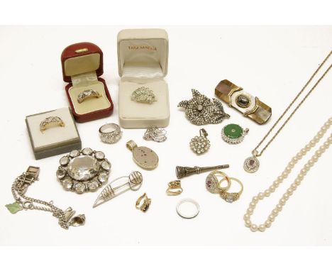 A collection of costume jewellery, to include a silver white and blue paste stone brooch, a gilt metal ruby ring and matching