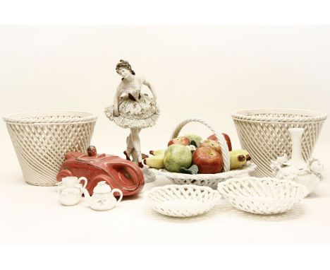 A collection of blanc de Chine ceramics,two baskets, a pink teapot, fruit in a basket, dishes, miniatures and figurine