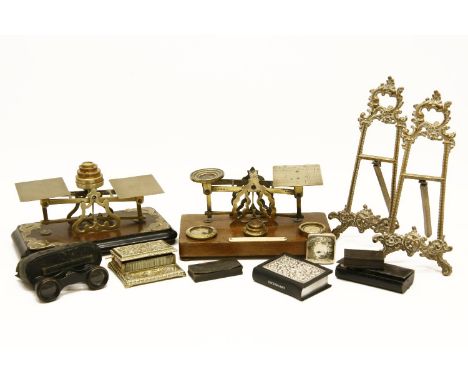 Two sets of postal scales, together with two brass easels and a collection of vesta cases, a miniature Bible with white trave