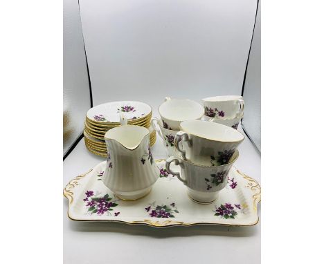 A part tea service "Royal Windsor" to include six cups and saucers, six side plates, milk jug and small tray 