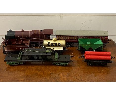 A Hornby, Meccano, Royal Scot 6100 railway engine 'O' gauge with light bulb to front boiler  and assorted rolling stock, all 