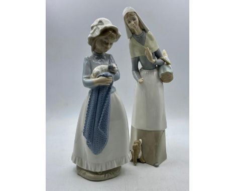 A Lladro figure of a lady holding a basket and dog at her feet along with a Nao figure of a girl holding a puppy in a blanket