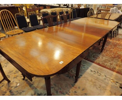 Large Victorian dining table with three leaves on eight reeded legs to ceramic castors 106 x 290 cm CONDITION REPORT: Good us