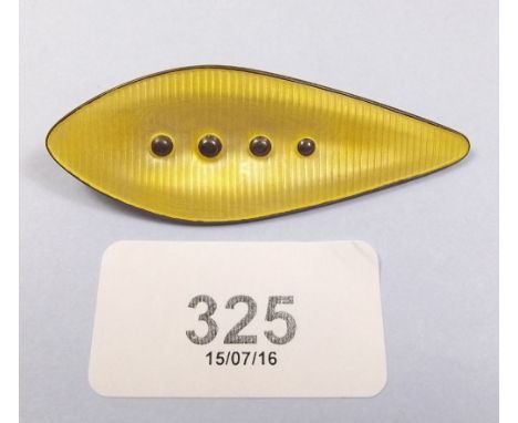 A Scandinavian silver and yellow enamel leaf form brooch