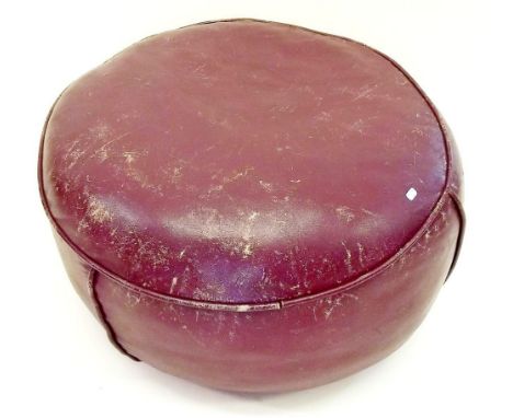 An early 20th century leather pouffe