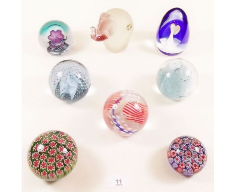 A group of eight Caithness paperweights - boxed