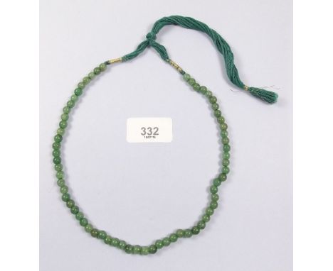 A jade bead necklace 