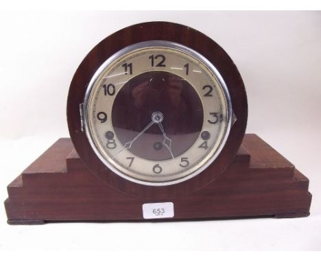 A 1930's mahogany striking mantel clock
