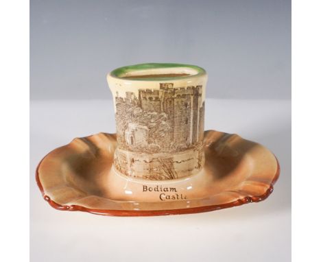 This vintage Royal Doulton Seriesware matchbox holder features a scenic landscape design on its cylindrical center, which ser