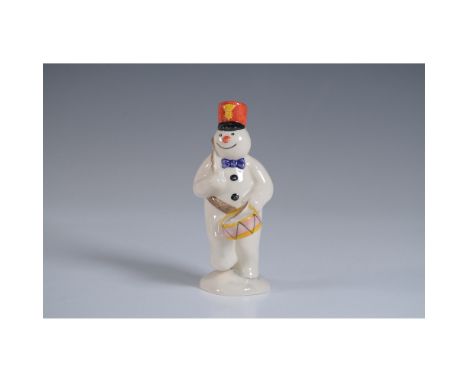 Charming Royal Doulton figurine from The Snowman Gift Collection, featuring the Drummer Snowman (DS15). This delightful ceram