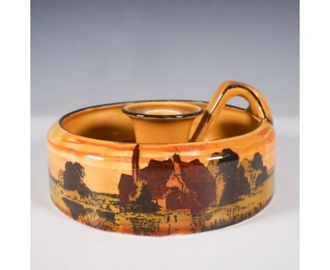 This Royal Doulton Seriesware candlestick, model D2846, features a stunning Art Deco-inspired design with a landscape scene i