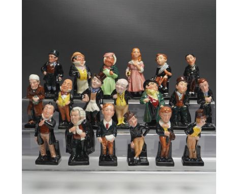 A charming collection of Royal Doulton miniature figurines featuring beloved characters from Charles Dickens’ literary works.