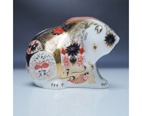 Elegant Royal Crown Derby porcelain paperweight, titled Rocky Mountain Bear, adorned in the classic Imari pattern with rich c