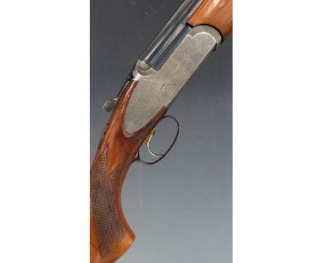 Rizzini 12 bore over and under sidelock shotgun with engraved locks, underside, trigger guard, top plate and thumb lever, che