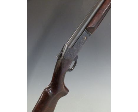 Scout 12 bore single barrelled shotgun with engraved lock, semi-pistol grip, sling suspension loops and 31.75 inch barrel, ov