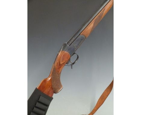 Baikal 12 bore single barrelled shotgun with chequered semi-pistol grip and forend, sling and 29 inch barrel, overall length 