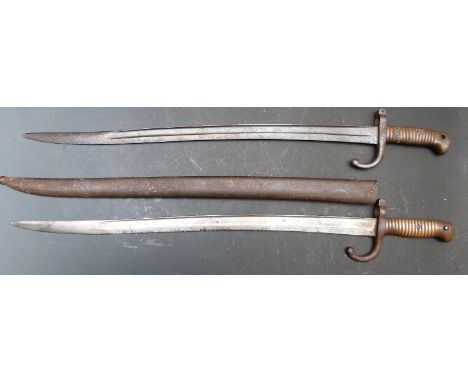 Two French Army 1866 pattern bayonets with yataghan 57cm blades one with scabbard, one named St Etienne 1871