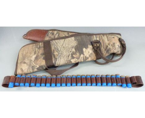 Twenty-four Winchester 12 bore shotgun cartridges together with a Mossy Oak camouflage gun slip.&nbsp;&nbsp;PLEASE NOTE THAT 