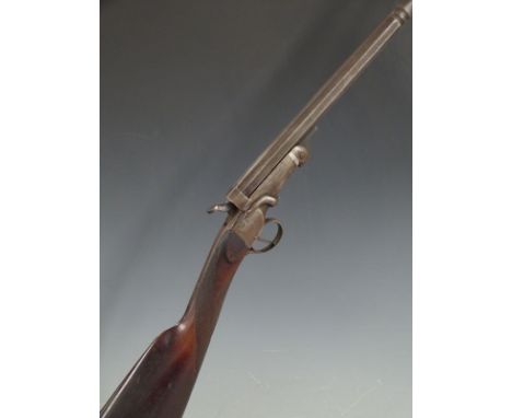 Unnamed .410 hammer action shotgun with chequered grip and 28.5 inch barrel, overall length 112cm,, serial number 70.&nbsp;PL
