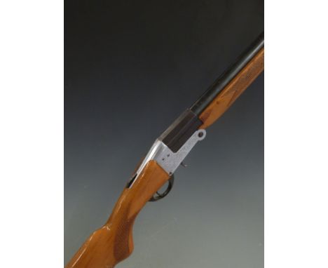 BSA 12 bore single barrelled folding poacher's shotgun with chequered semi-pistol grip and forend, engraved locks and top pla