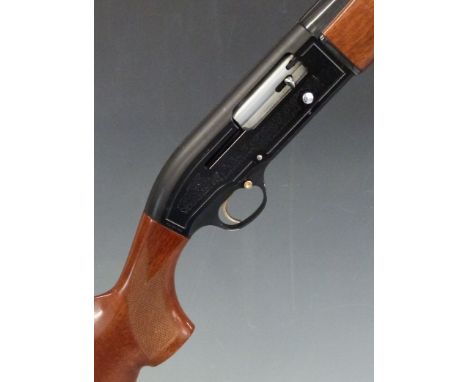 Beretta A303 12 bore three shot semi-automatic shotgun with named and engraved locks, chequered semi-pistol grip, single trig