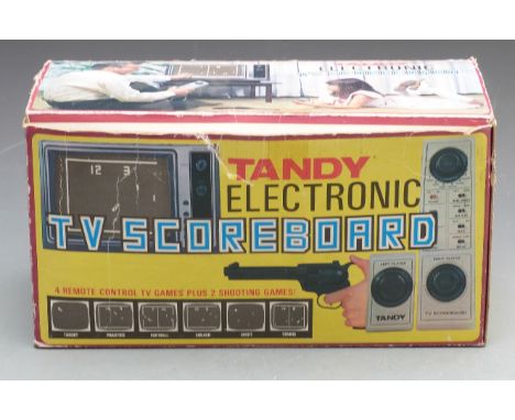 Tandy Electronic TV Scoreboard video games console with pistol controller, in original box.&nbsp;