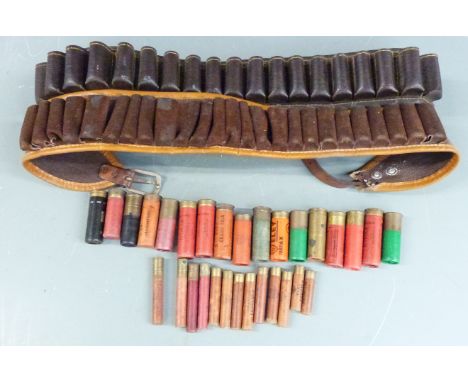 Thirty paper and brass cased collectable shotgun cartridges including Henry Atkin, Eley etc together with two shotgun cartrid