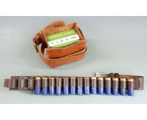 Thirty-four 12 bore shotgun cartridges together with a leather cartridge belt and similar cartridge bag.&nbsp;PLEASE NOTE THA