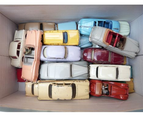 Twenty-six Dinky Toys diecast model cars including, Aston Martin, Sunbeam Alpine, Triumph TR2, MG Midget, Austin Atlantic etc