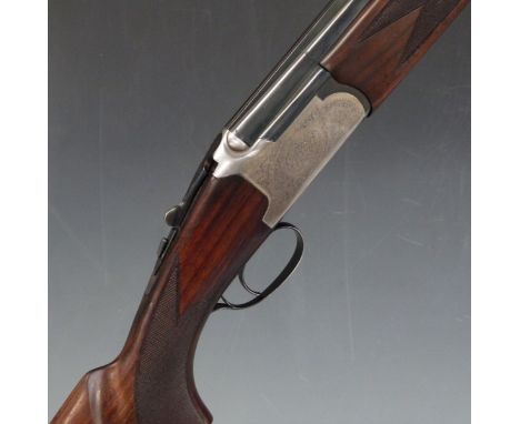 Lanber 12 bore over and under shotgun with engraved locks, underside, trigger guard, top plate and thumb lever, chequered sem