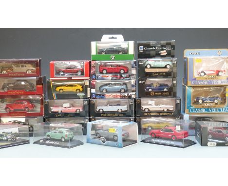 Twenty-five New Ray, ERTL, RexToys, Oxford Automobile Company, Saico, Schabak and similar diecast model vehicles, all in orig