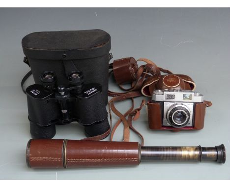 A Kershaw &amp; Sons Leeds telescope, Regent 16x50 binoculars and a Zeiss Ikon Contina camera