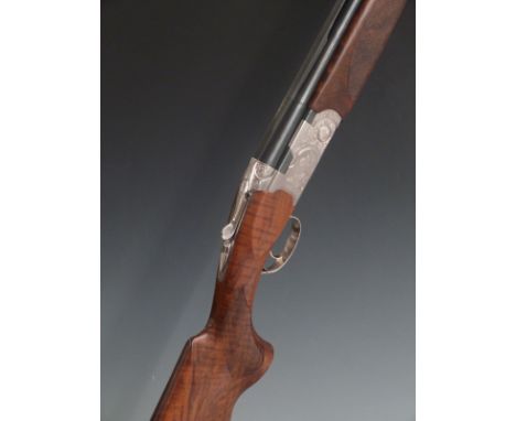 Cased Beretta S687 Sporting Silver Pigeon III 12 bore over and under ejector shotgun with bird scenes engraved to the lock, a
