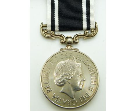 Prison Service Medal named to officer P Ulyatt, with box