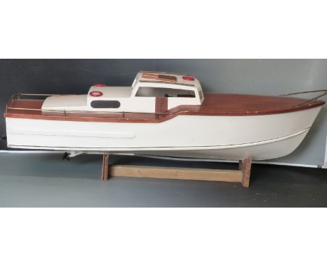 Model remote control petrol driven model motor launch or boat with air cooled engine but with alternative water cooled head. 