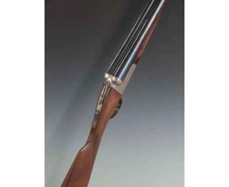 Gunmark Kestrel 12 bore side by side shotgun with named and engraved lock, engraved trigger guard, underside and top plate, c