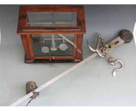 Avery steelyard and a cased set of laboratory scales