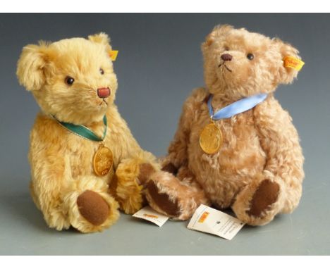 Two Steiff Teddy bears The 2002 Bear with blonde mohair and The 2001 Bear with yellow mohair, each 30cm tall, both limited ed