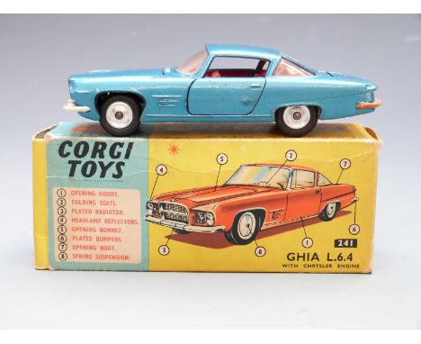 Corgi Toys diecast model Ghia L.6.4 with Chrysler engine, metalic blue body, red interior and Corgi dog on the parcel shelf, 