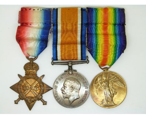 British Army WWI medals comprising 1914/1915 Star, War Medal and Victory Medal named to 1451 Gunner J S Devine, Royal Field A