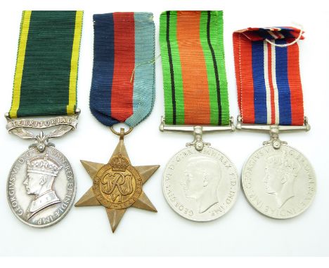 British Army WWII medals comprising 1939/1945 Star, Defence Medal, War Medal and Territorial&nbsp;Efficiency Medal named to 7