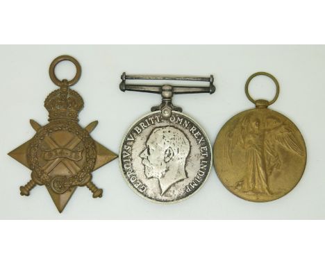 British Army WWI medals comprising 1914/1915 Star, War Medal and Victory Medal named to 5089 Bombardier J E Powell, Royal Fie