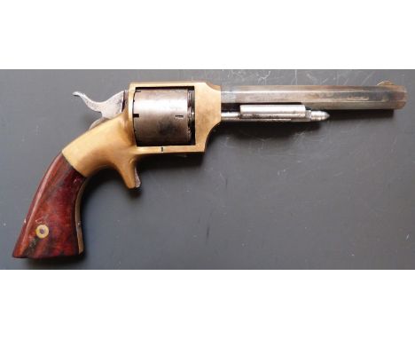 Lucius W Pond .32 six-shot single action rimfire revolver with brass frame shaped wooden grips, sheathed trigger and 5 inch o