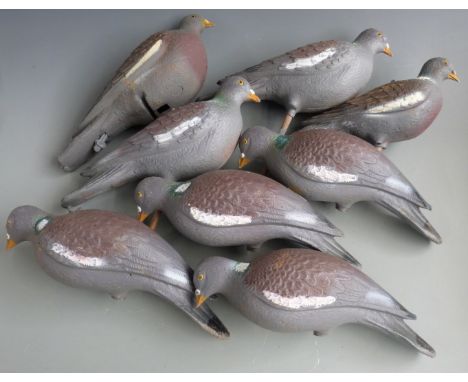 Eight plastic pigeon decoys, some with stick mounts&nbsp;