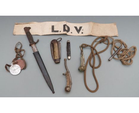 Small quantity of militaria including identification discs for C R Brown 9th Battalion Royal Scots, two bosun's whistles, LDV