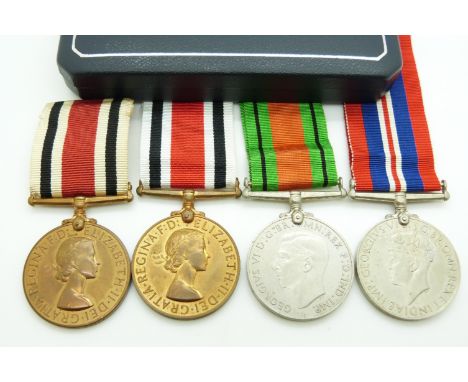 WWII Defence Medal, War Medal and Special Constabulary Medal (Elizabeth II) for William F King together with a boxed example 