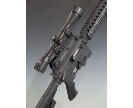 Mossberg 715T .22 assault style rifle with pistol grip, adjustable stock, spare magazines, sound moderator, Hawke Sport HD 4x
