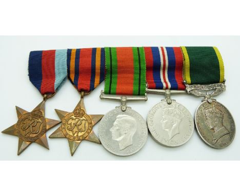 British Army WWII medals comprising 1939/1945 Star, Burma Star, Defence Medal, War Medal and Territorial&nbsp;Efficiency Meda