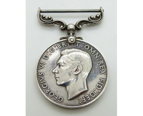 Royal Air Force Long Service and Good Conduct Medal (George VI) named to 511609 Sgt R H Magee, RAF